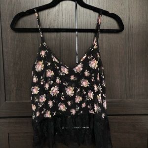 Women’s black see-through top with flowers